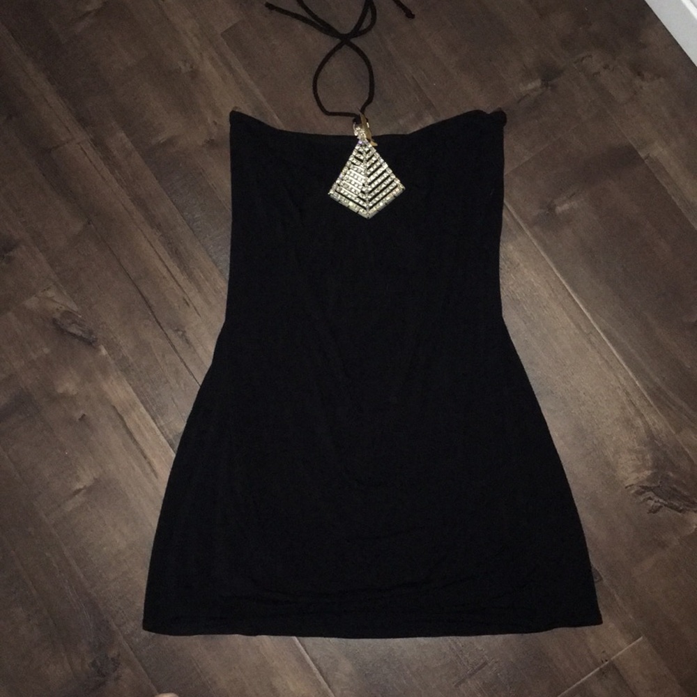 Halter dress with gold and diamond embellishments.